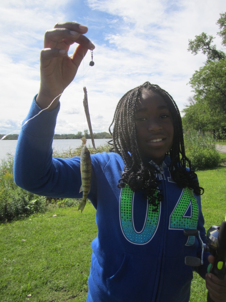 A participant in our fishing derby event in partnership with Fishin' Buddies, part of a series of free recreation events in the Calumet region.