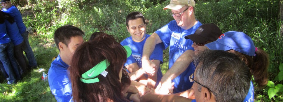 Nielson employees participate in a corporate workday, including team-building exercises.