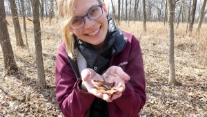 A dedicated volunteer at Somme Woods helps save a blue spotted salamander.