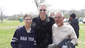 Ron Rodriguez and his son, Alex, meet Forest Preserve District President Toni Preckwinkle on Earth Day.